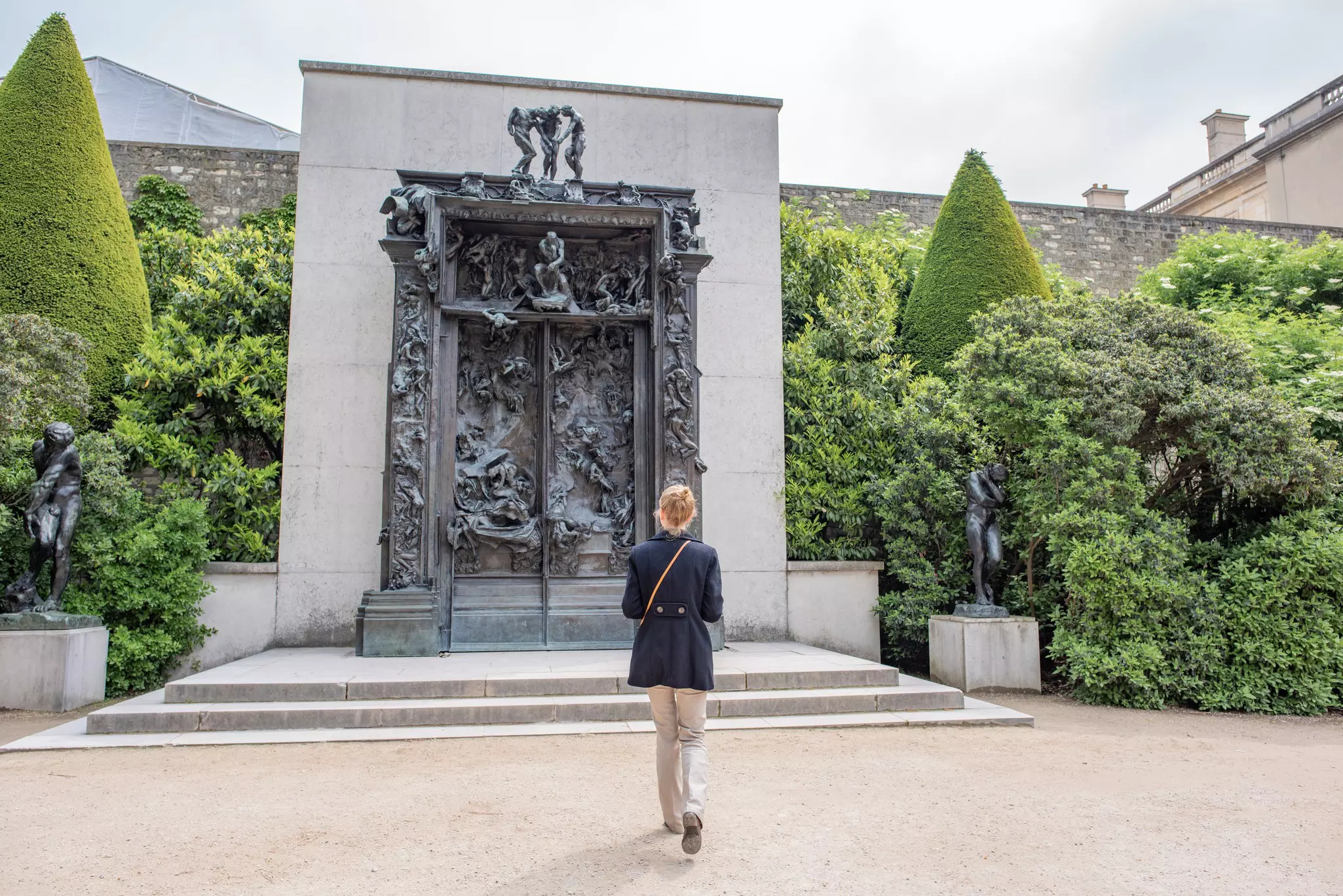 The author looks out onto the museum's manicured gardens