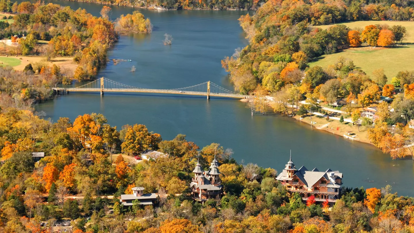 An aerial view of Eureka Springs, Arkansas, in autumn with colorful foliage