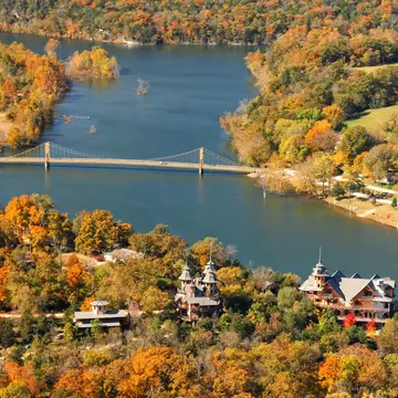 An aerial view of Eureka Springs, Arkansas, in autumn with colorful foliage
