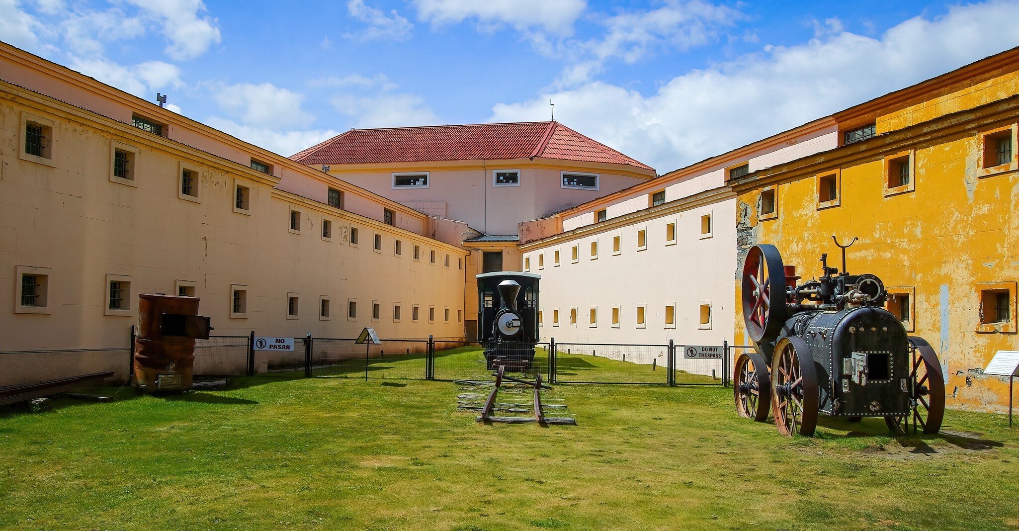 Heritage steam train locomotive in the courtyard of the Maritime Museum of Ushuaia housed in the Presidio, the old prison of Ushuaia in Tierra del Fuego, Argentina.