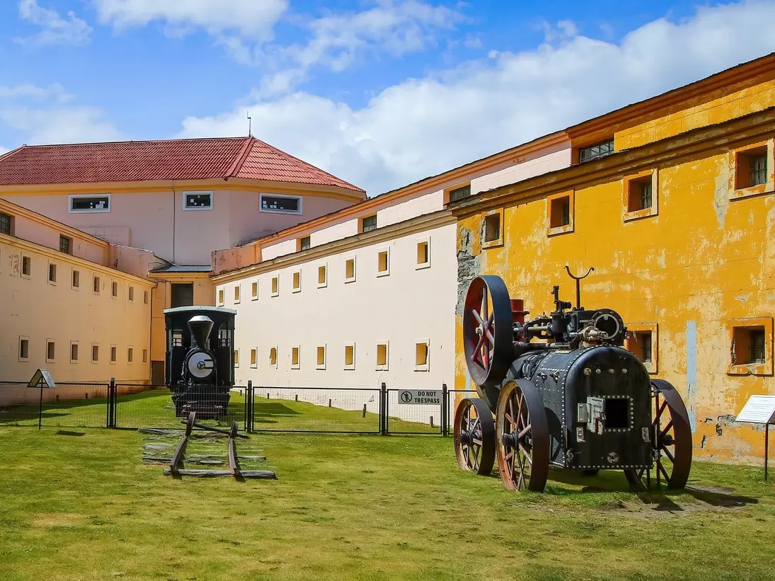 Heritage steam train locomotive in the courtyard of the Maritime Museum of Ushuaia housed in the Presidio, the old prison of Ushuaia in Tierra del Fuego, Argentina.