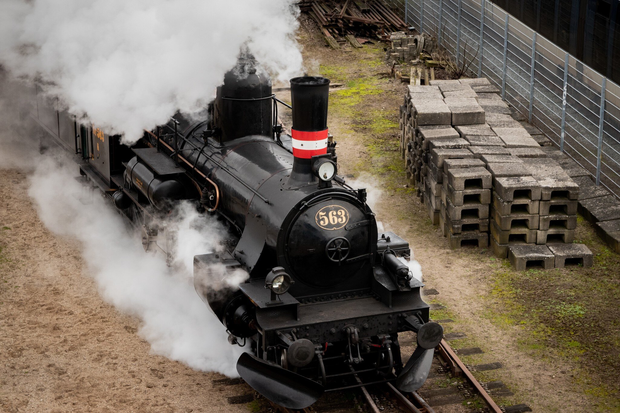 Model K 563  steam engine departing the danish railroad museum in Odense, Denmark.