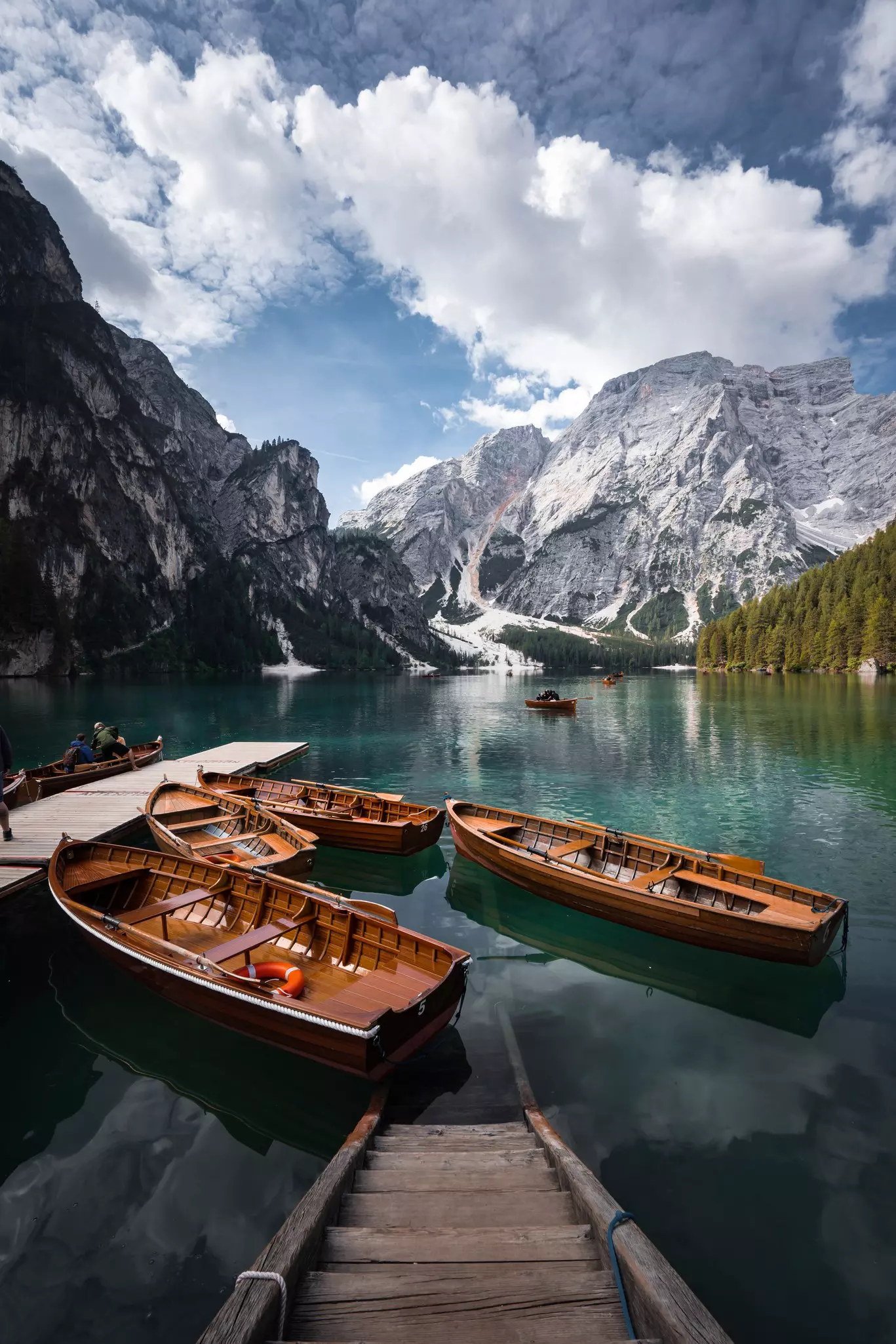 Boat hut on Braies Lake with Seekofel in the background, the Dolomites, South Tyrol