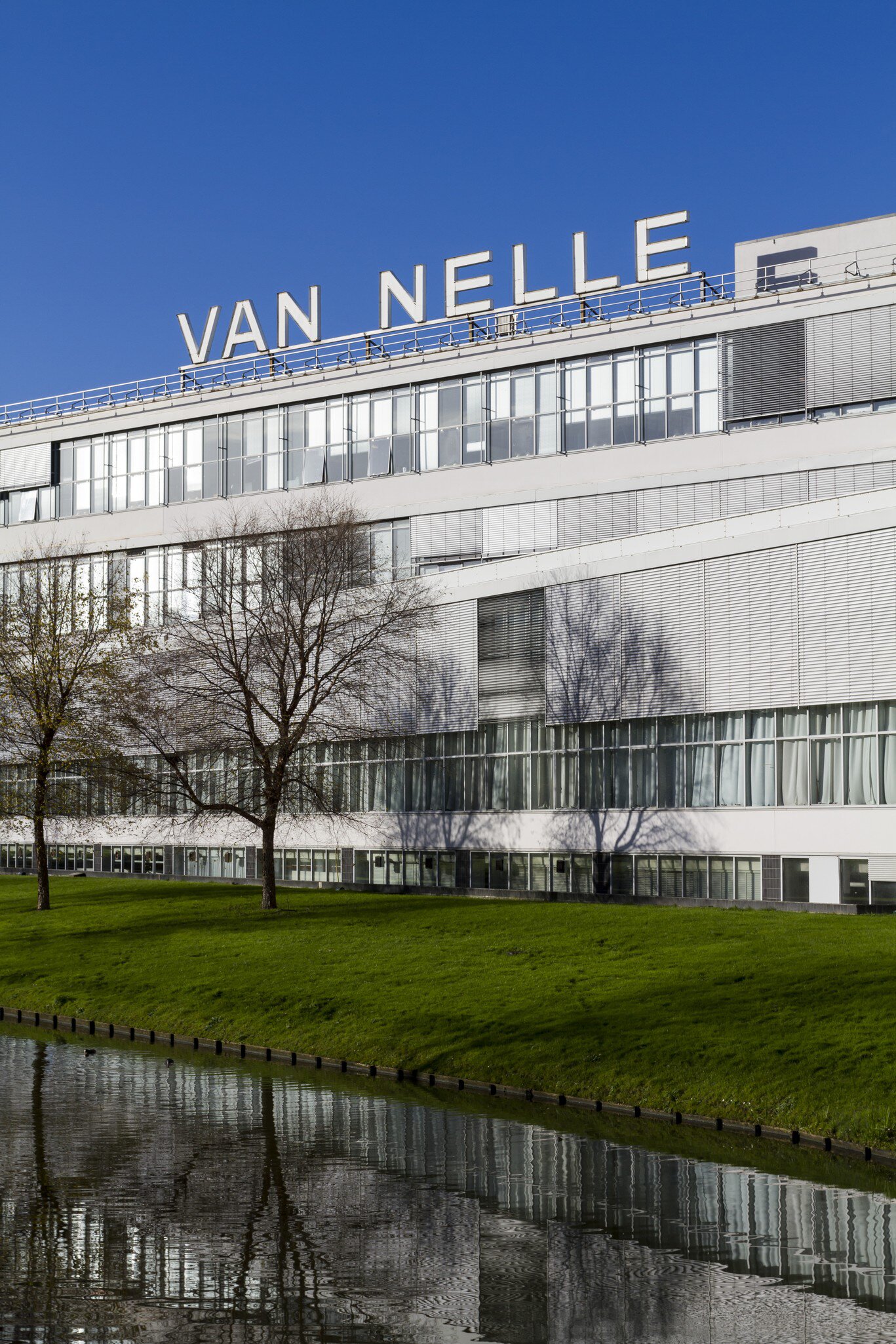 ROTTERDAM, THE NETHERLANDS - NOVEMBER  26 2015: Facade of the Van Nelle Factory which is considered a prime example of the International Style. It has been a UNESCO World Heritage Site since 2014.  License Type: media  Download Time: 2024-01-29T04:23:45.000Z  User: claramonitto  Is Editorial: Yes  purchase_order:   