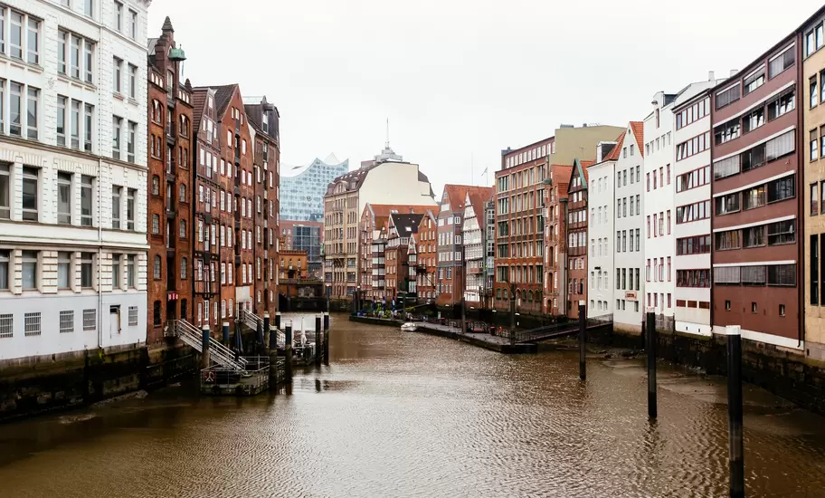 Old buildings along a canal in Hamburg's historic district, Germany