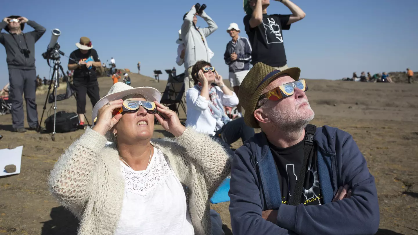 The total solar eclipse on April 8, 2024 will cross a swath of US states. If you travel, be sure to bring your own glasses © Natalie Behring / Getty Images