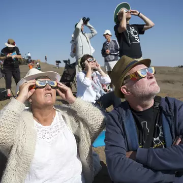 The total solar eclipse on April 8, 2024 will cross a swath of US states. If you travel, be sure to bring your own glasses © Natalie Behring / Getty Images