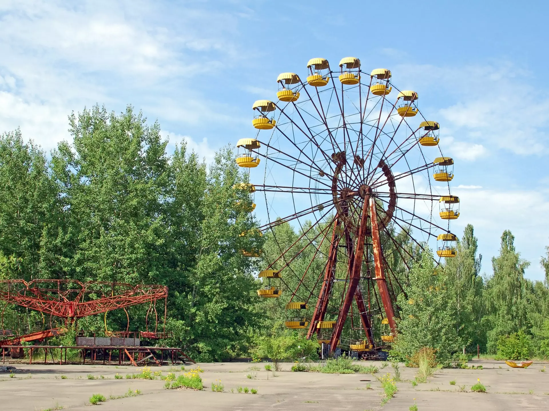 Abandoned ferris wheel in amusement park in Pripyat, Chernobyl area
abandoned, amusement, atomic, breakdown, brick, carousel, catastrophe, chernobyl, city, construction, crash, damage, dangerous, derelict, deserted, destruction, disaster, ecological, ecology, environmental, europe, exterior, ferris, forgotten, green, isotope, kiev, leaf, lorn, lost, nuclear, park, plant, pollution, pripyat, radiation, radioactive, risk, ruined, rusty, scene, soviet, tree, ukraine, uncared, uranium, urban, wheel, zone