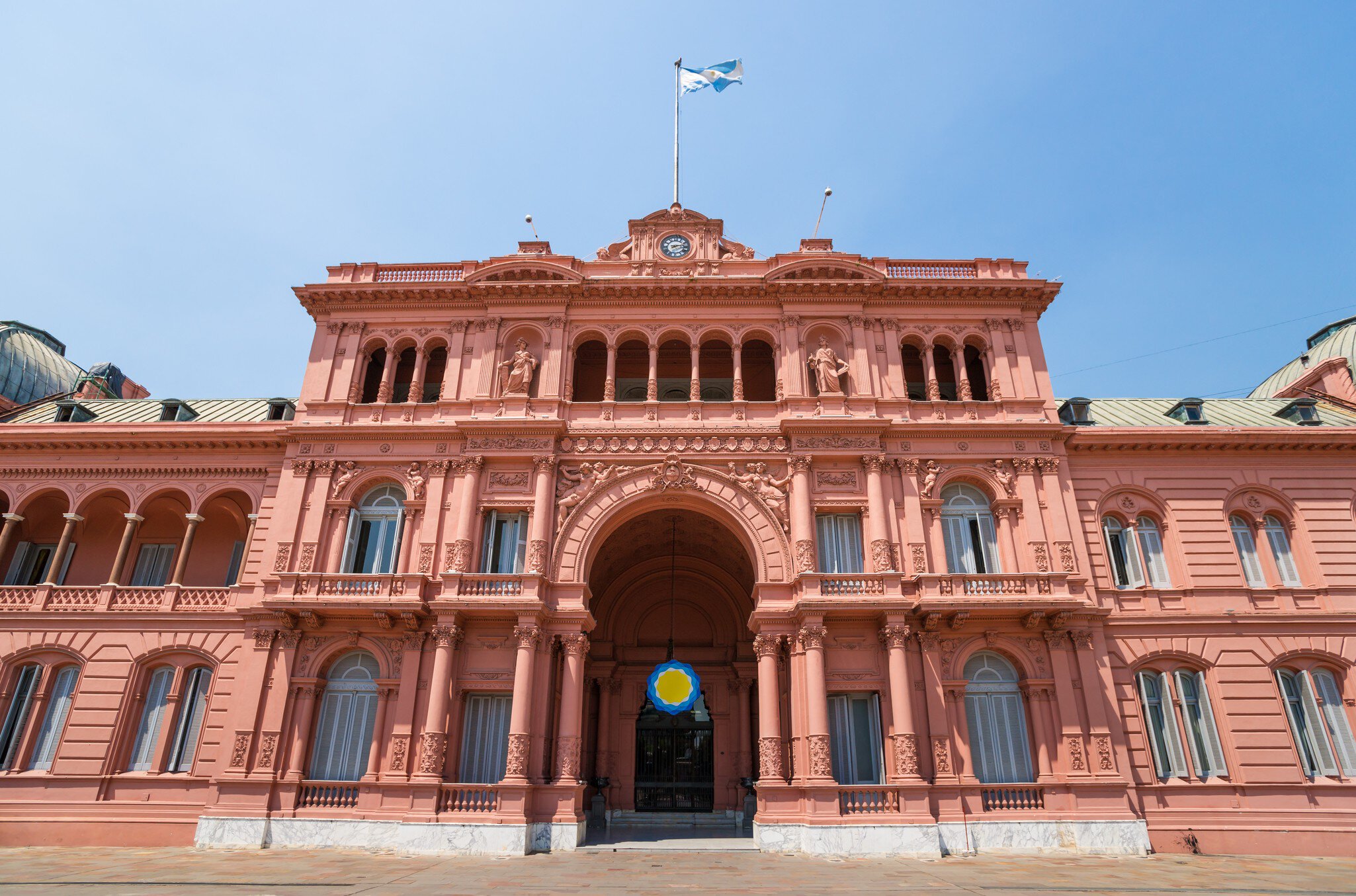 Casa Rosada (Pink House) is Argentina's presidential palace. Visible are balconies from which Evita PerAn addressed people of Argentina.
174851418
"Casa Rosada, Plaza de Mayo, Facade, Colonial Style, Pink, Famous Place, Buenos Aires, Argentina, South America, Balcony", Outdoors, Capital Cities, Horizontal, Pink Color, Balcony, Casa Rosada, No People, Photography