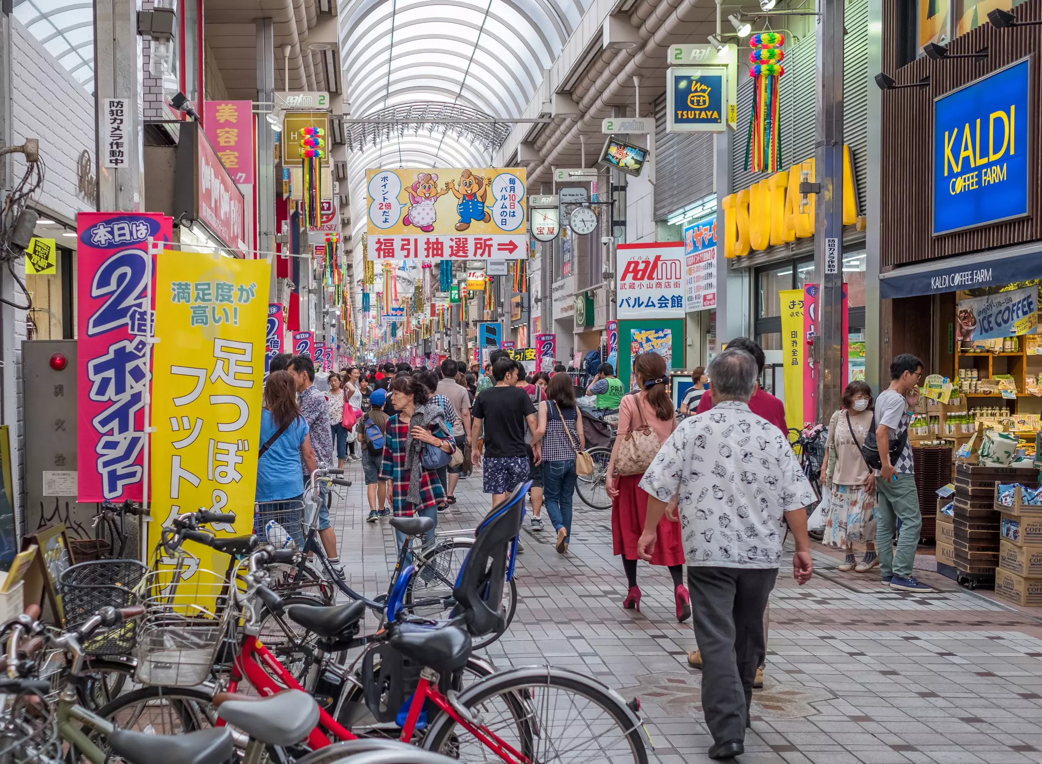 Shoppers in a covered shopping arcade