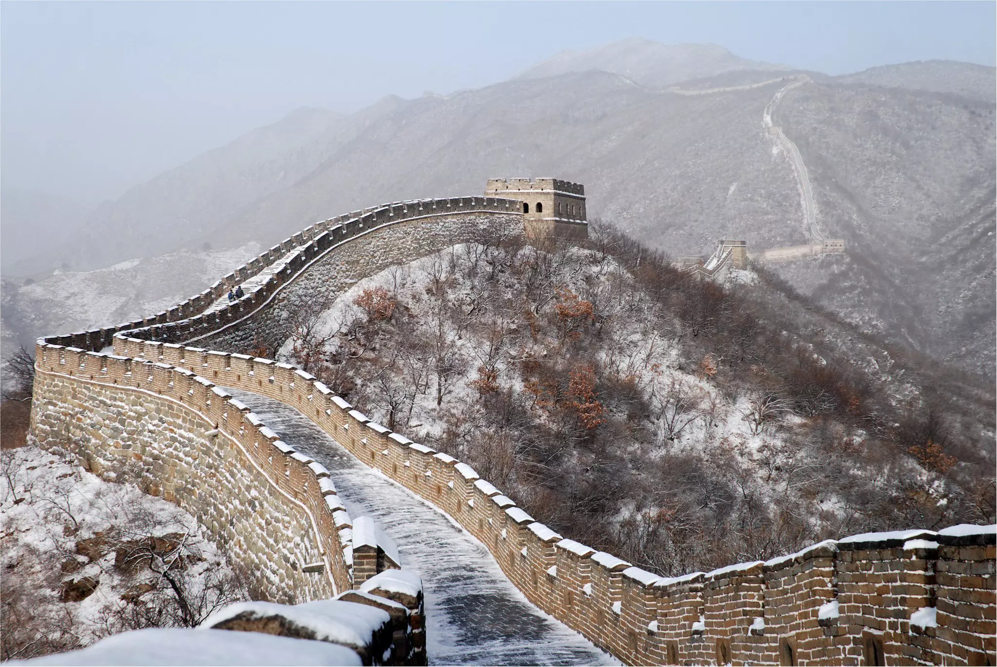 A section of the Great Wall of China dusted with snow during winter. automaton1/Getty Images