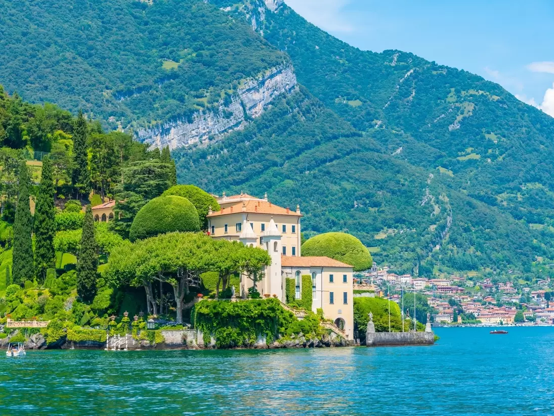 Villa del Balbianello at Lake Como in Italy, with the mountains rising behind.