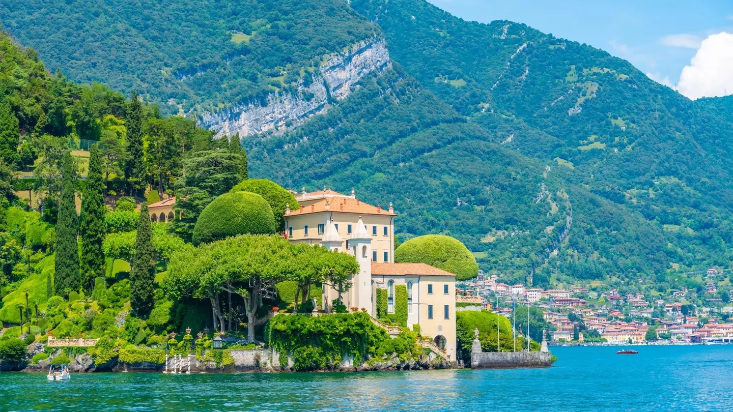 Villa del Balbianello at Lake Como in Italy, with the mountains rising behind.