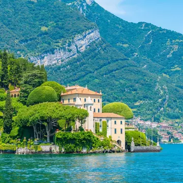 Villa del Balbianello at Lake Como in Italy, with the mountains rising behind.