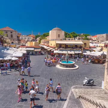 Rhodes, Greece - August 2016: Evreon Martyron Square Jewish Martyrs Square in the beautiful and flamboyant Old Medieval City of Rhodes, a popular summer tourist attraction; Shutterstock ID 1366955675;