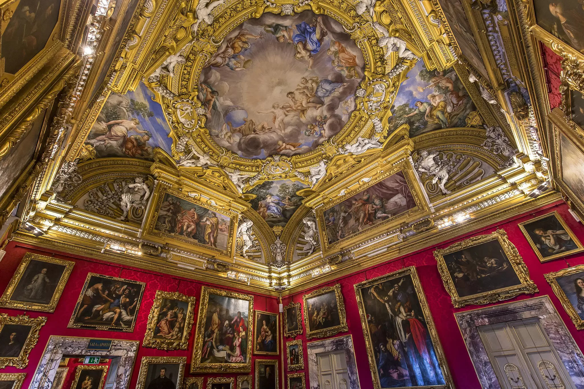 Frescoes and paintings in the Sala di Apollo inside the Palazzo Pitti in Florence, Italy.