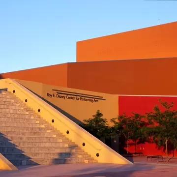 Sunset splashes across the Roy E. Disney Center for Performing Arts, National Hispanic Cultural Center