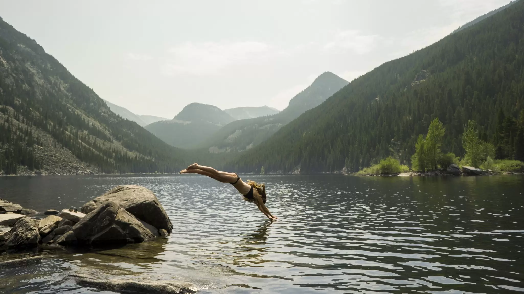 From sunny summer days by a lake to skiing on fresh powder, here's how to spend your time in Bozeman through the year © Jordan Siemens / Getty Images