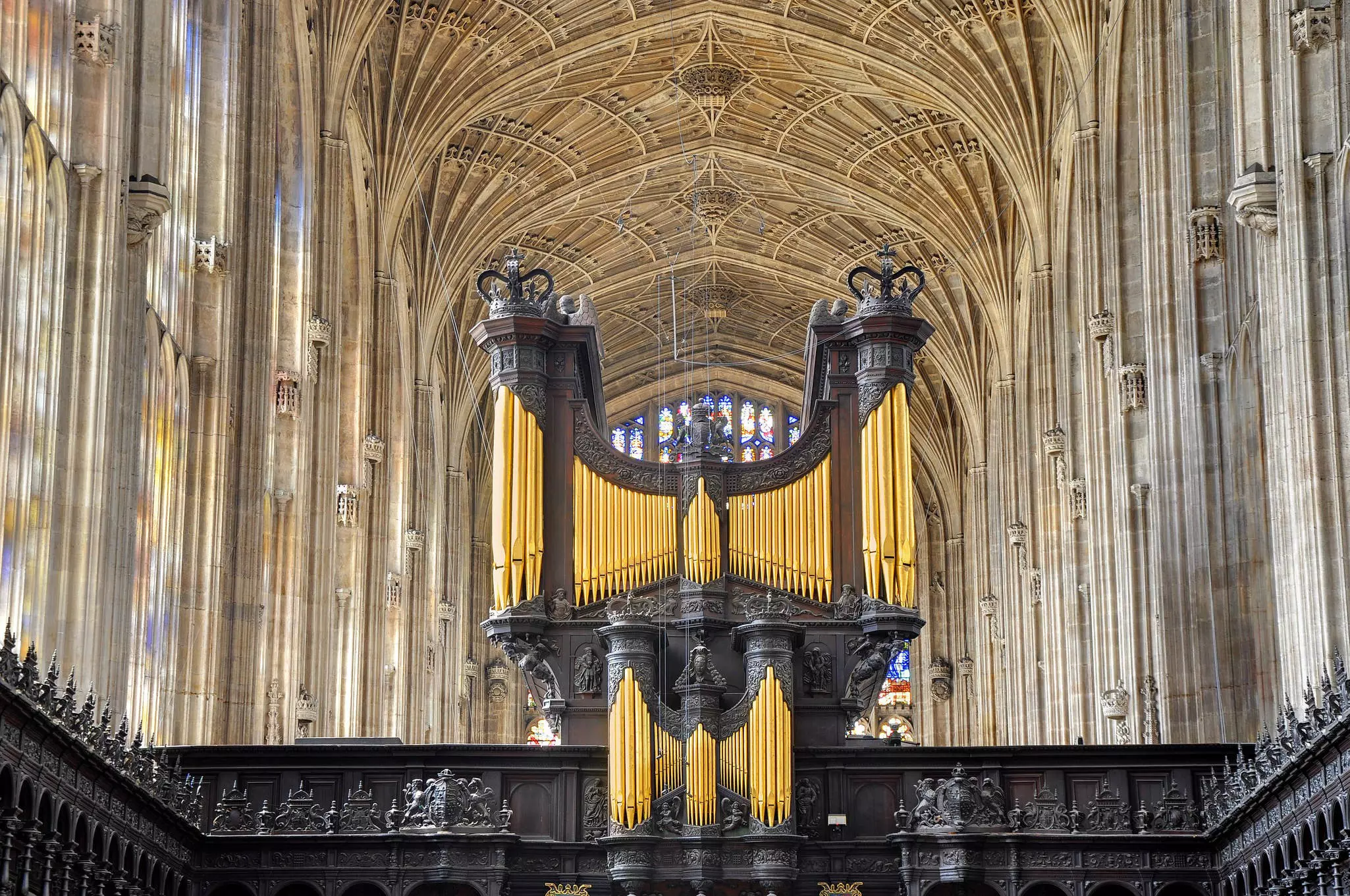The ornate vaulted ceiling and church organ at King's College Chapel, Cambridge, England.