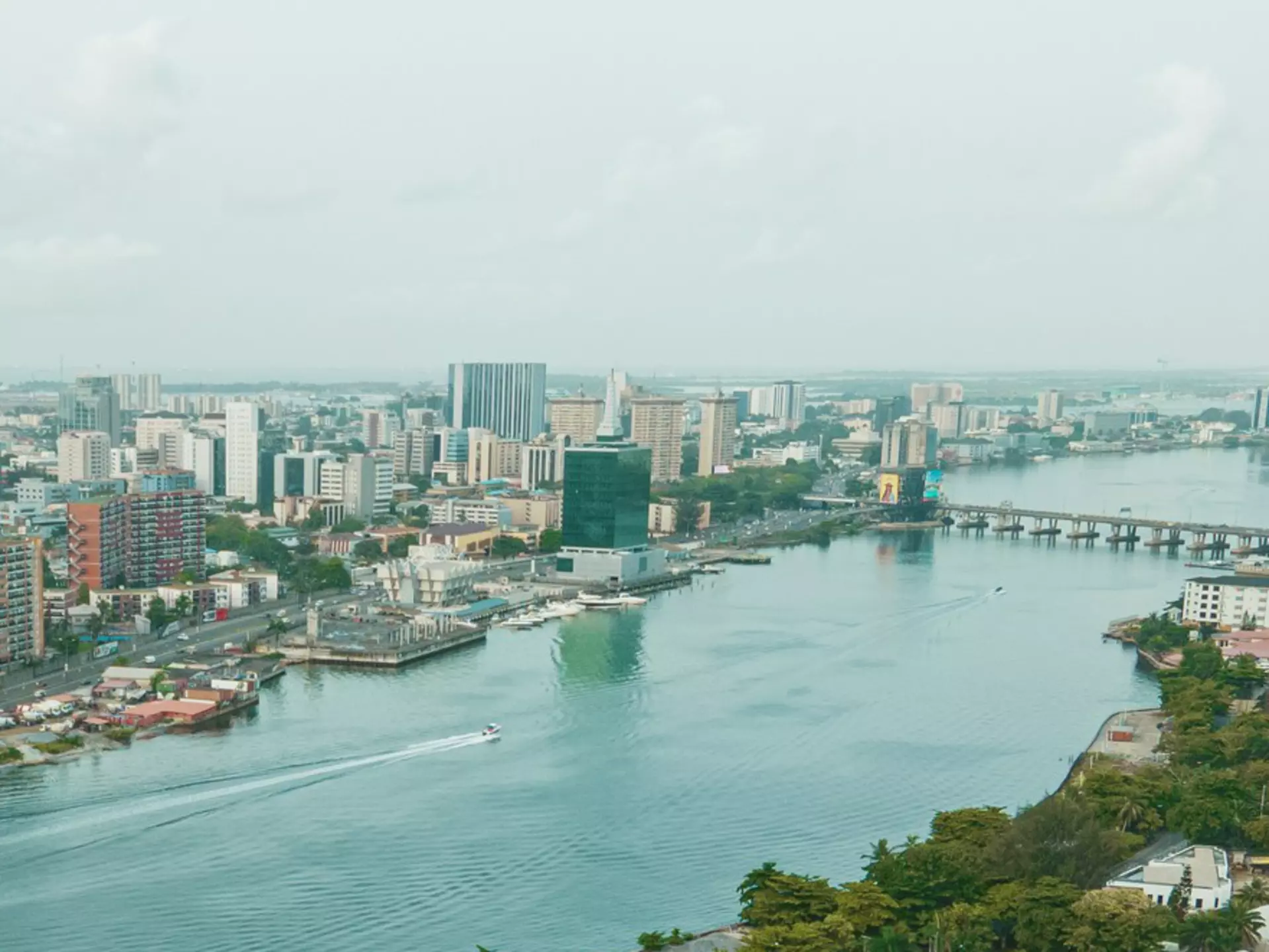 A densely built city across a river.
