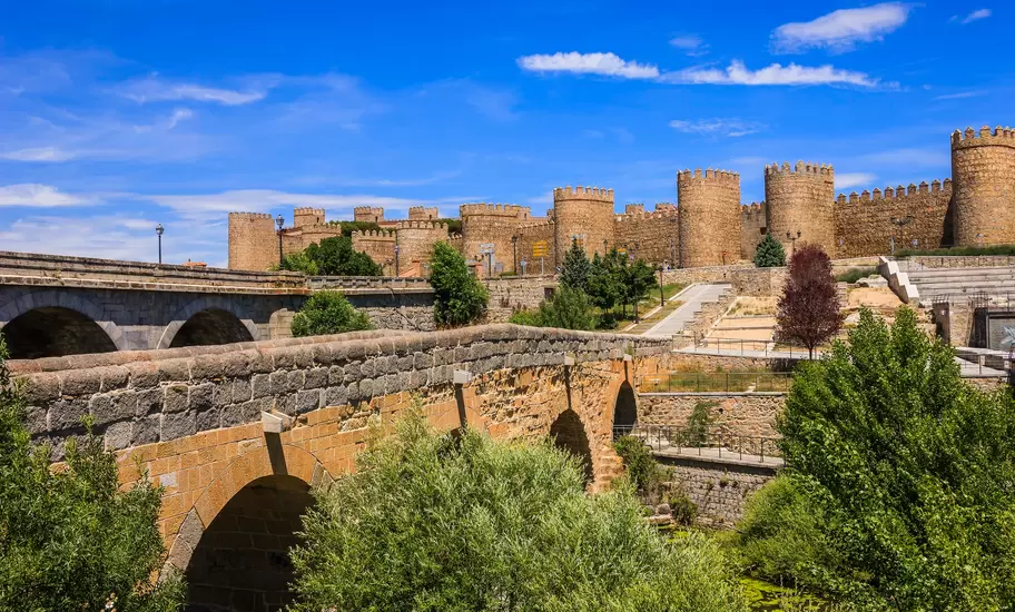 The walled town and the Romanesque bridge