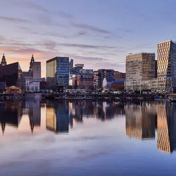 Historic and modern architecture mingles on Liverpool's famous waterfront. Andrea Pistolesi/Getty Images