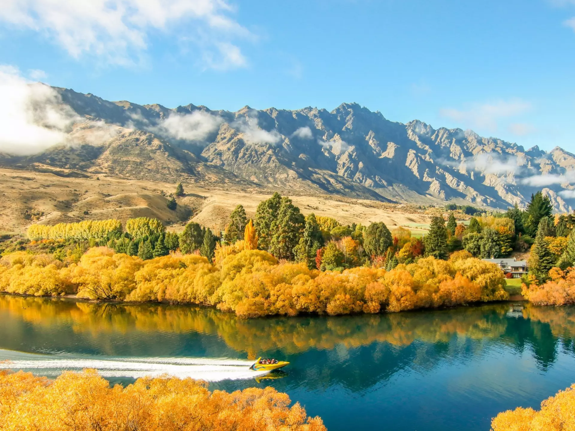 The Shotover River in fall, Queenstown. HE IS PATRICK/Shutterstock