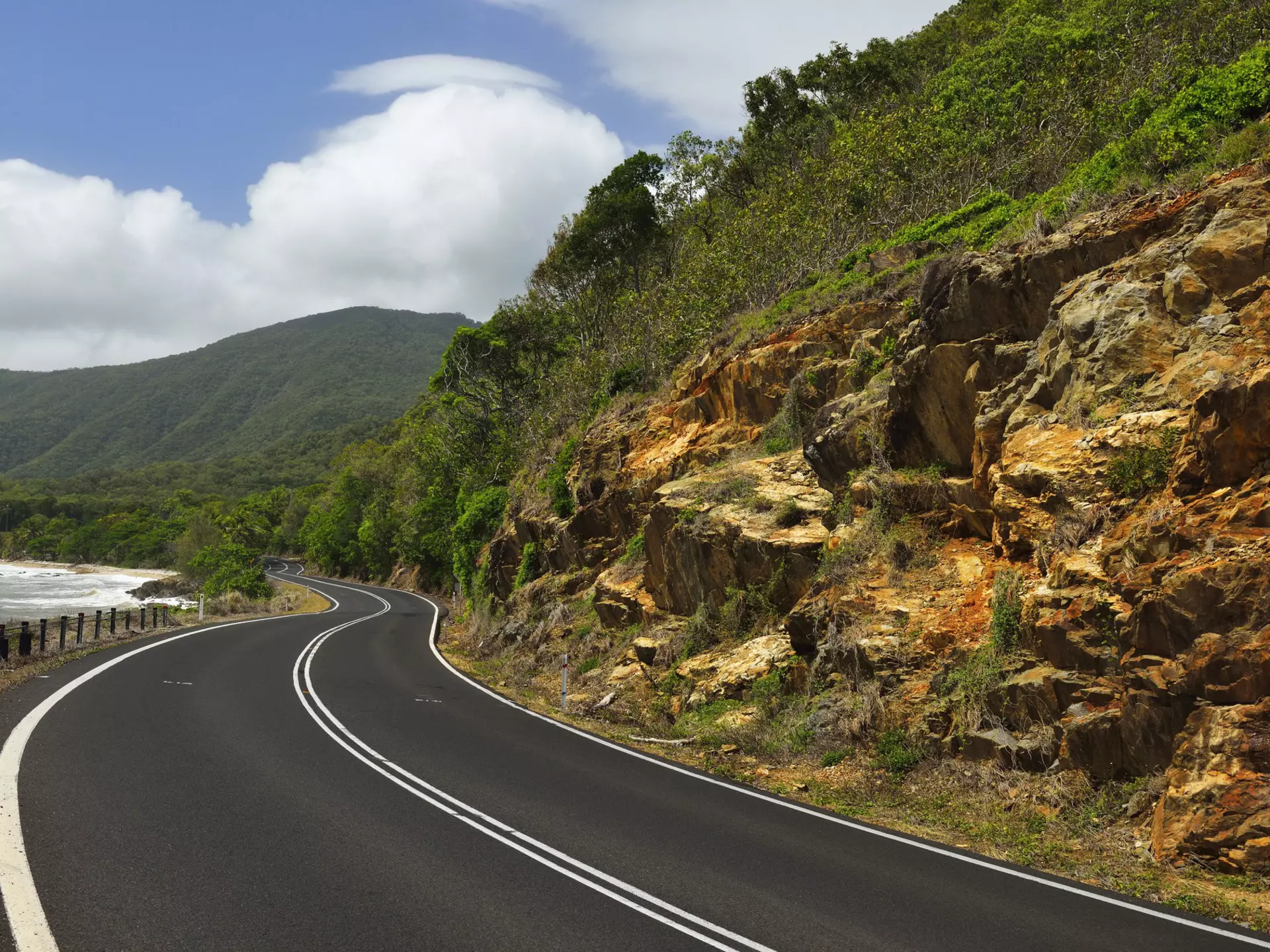 656287685
Photography; Queensland; Australia; Curve; Day; Diminishing Perspective; Direction; Directional Sign; Dividing Line; Landscape; Line; Outdoors; Tranquil Scene; Transportation; Captain Cook Highway; Highway; Road; Rock; Rock - Object; Rocky; Scenics; Travel Destinations; Two Lane Highway; Cliff; Coastal Feature; Coastal Road; Color Image; Horizontal; Nature; No Passing; No People; Non-Urban Scene; Viewpoint; Wind; Winding Road;
Winding Coastal Road, Captain Cook Highway, Queensland, Australia