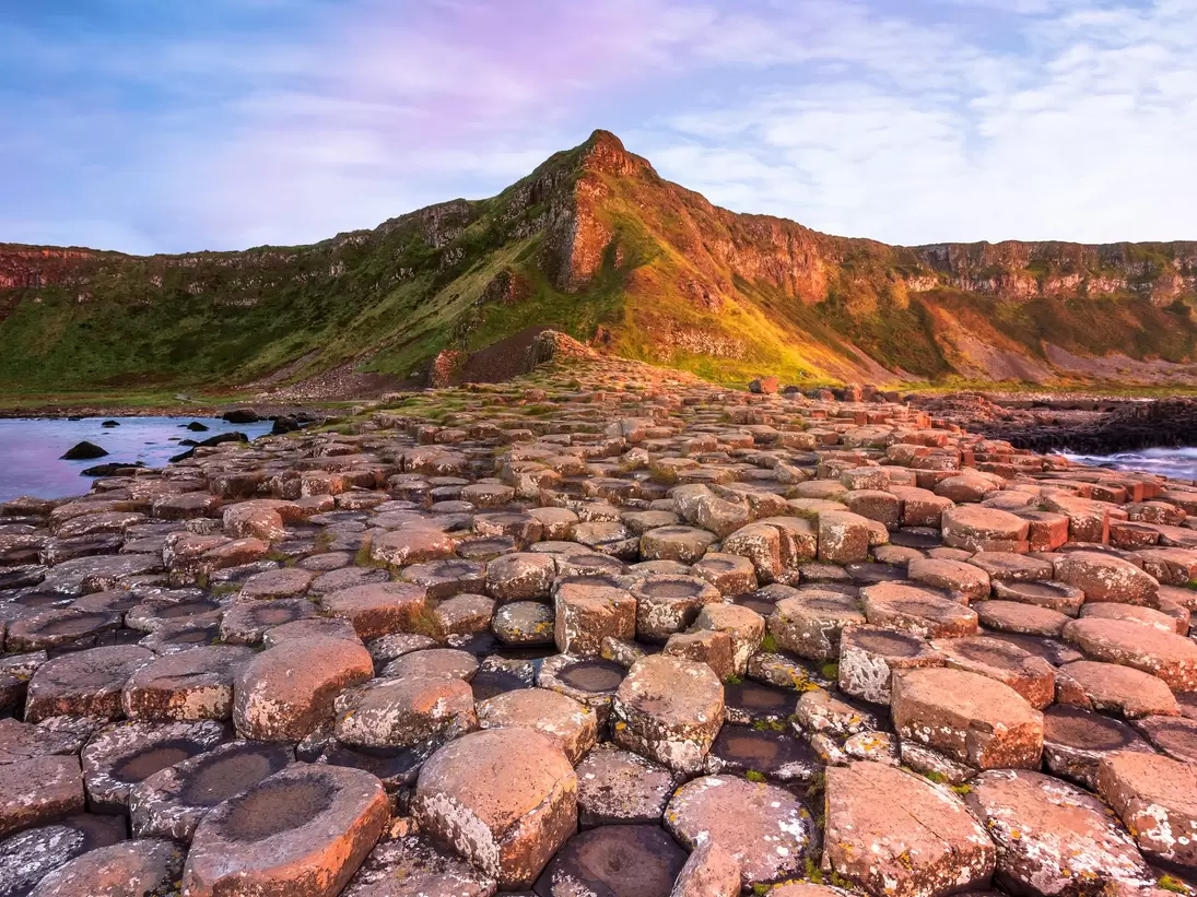 The Giant's Causeway is the most famous mythical site on the island of Ireland. joe daniel price / Getty Images