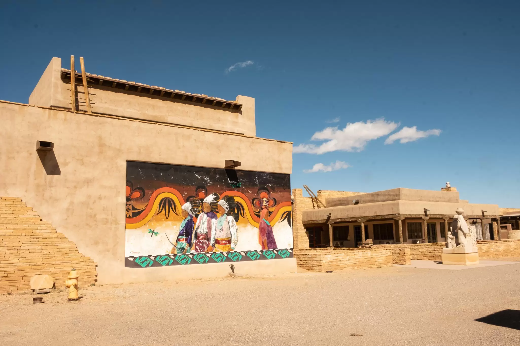 A mural adorns the entrance to Acoma Pueblo Sky City Cultural Center