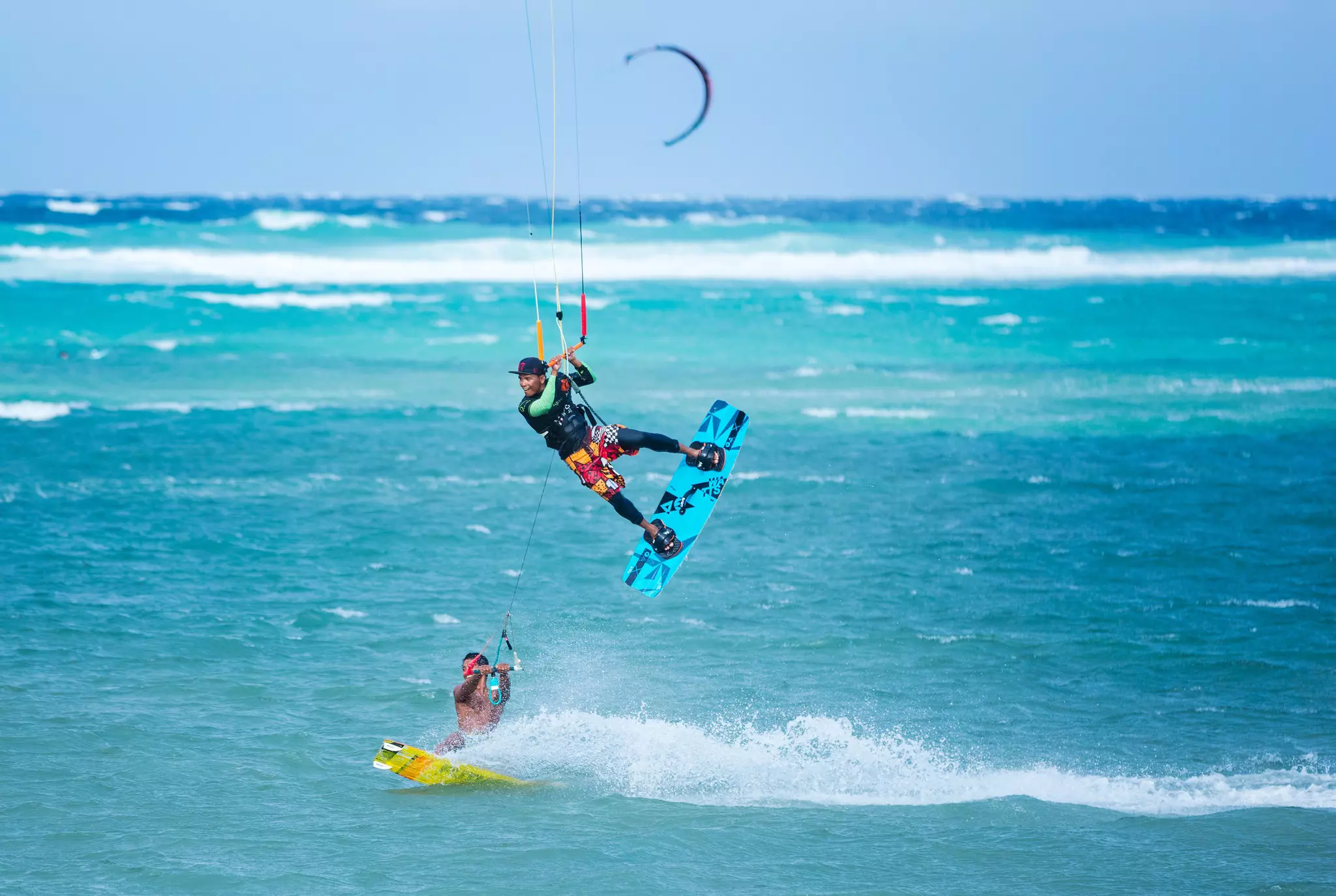 Two kiteboarders on Boracay Island, Philippines