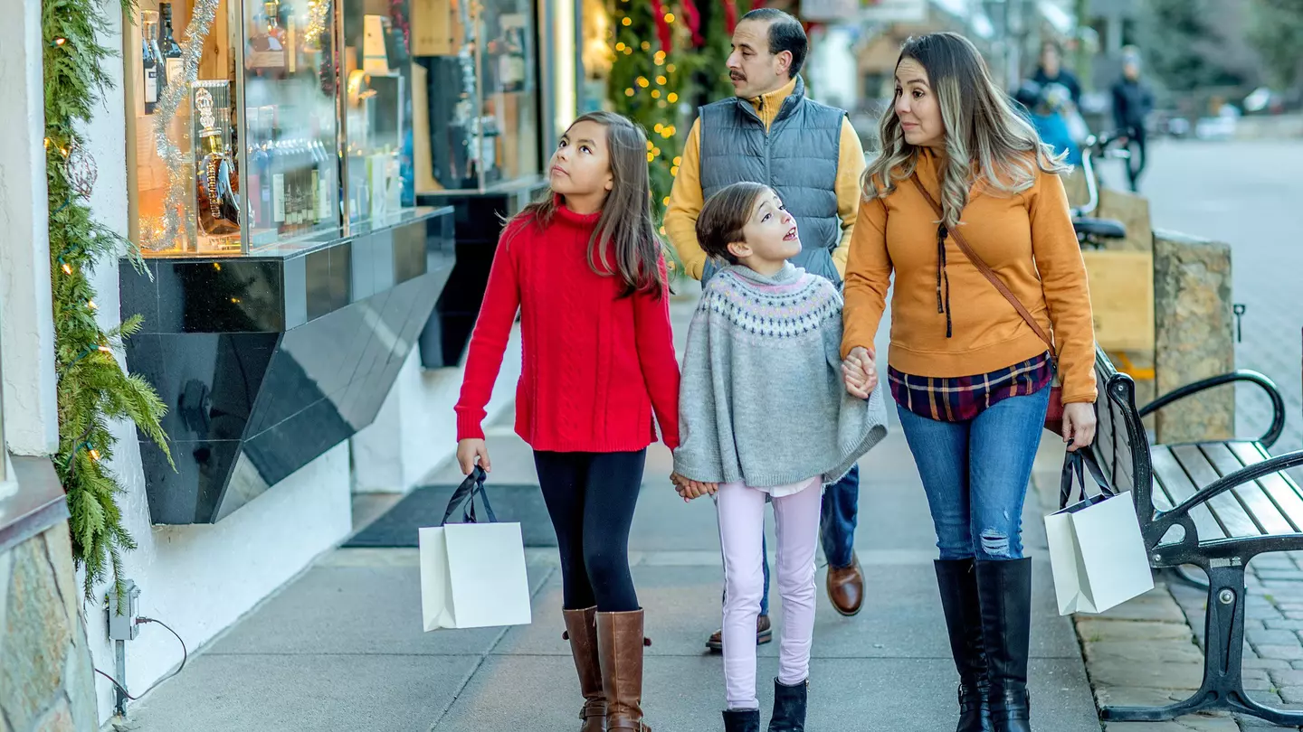 Two men examining a jug found at the city at the Palace of Dazzling Aten in Egypt