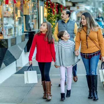 Two men examining a jug found at the city at the Palace of Dazzling Aten in Egypt