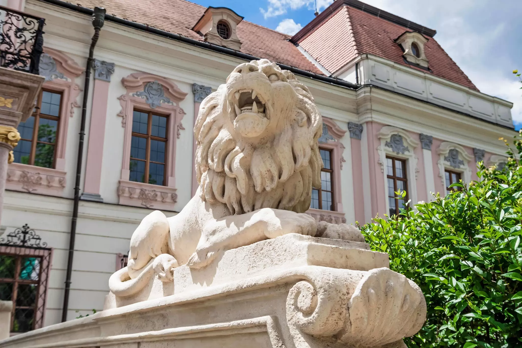 Close-up of a lion statue at the Gödöllő Royal Palace near Budapest, Hungary.