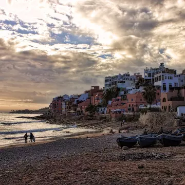 View of a seaside town at sunset