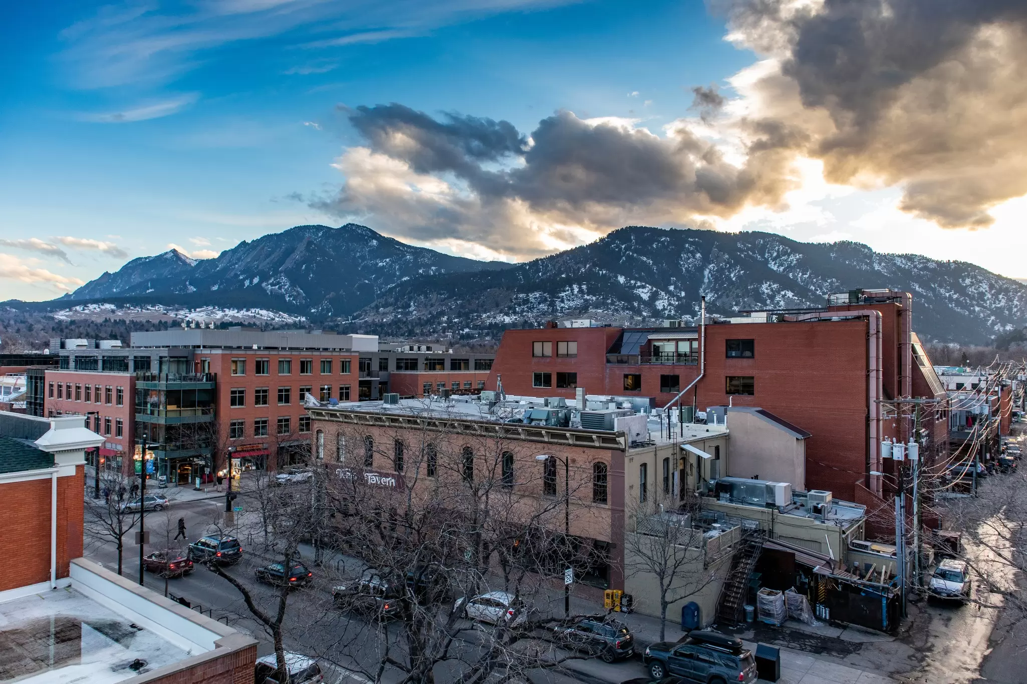 A grid of city streets near snow-covered mountains: Boulder, Colorado