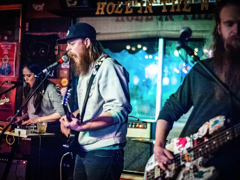 A band plays on a stage 