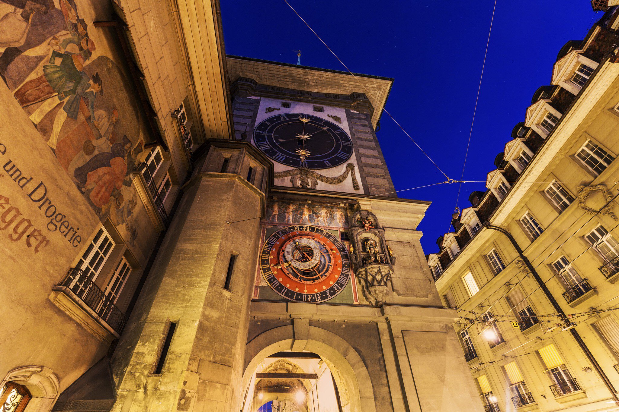 Zytglogge clock tower lit up at night, in Bern.