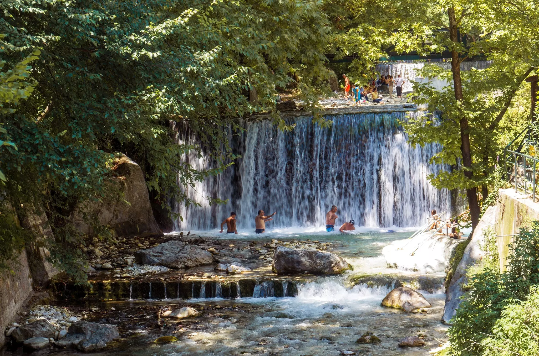Loutraki, Macedonia, Greece-15 Jules 2018: Tourists relax in the warm thermal waters of Pozar, License Type: media, Download Time: 2024-11-26T02:38:21.000Z, User: mvm_lonelyplanet, Editorial: true, purchase_order: 56530 - Guidebooks, job: Global Publishing-WIP, client: Greece 17, other: Virginia Moreno