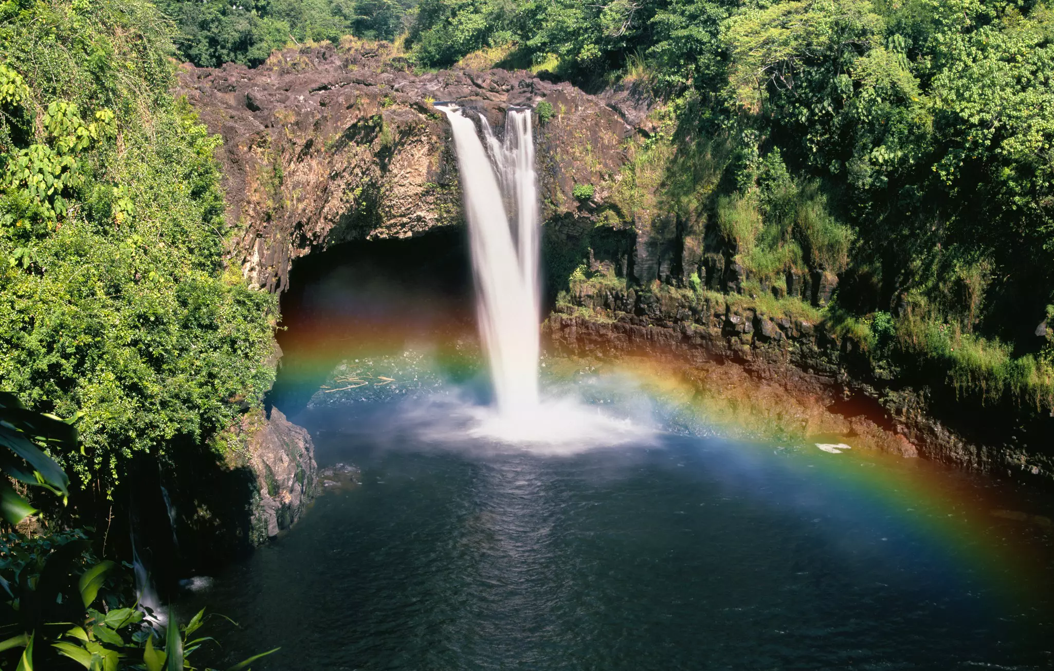 Head to Wailua Falls early in the day to see rainbows emerge in the mist © Michael Warwick / Shutterstock