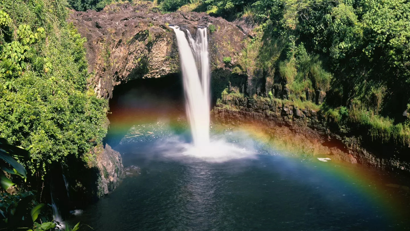 Head to Wailua Falls early in the day to see rainbows emerge in the mist © Michael Warwick / Shutterstock