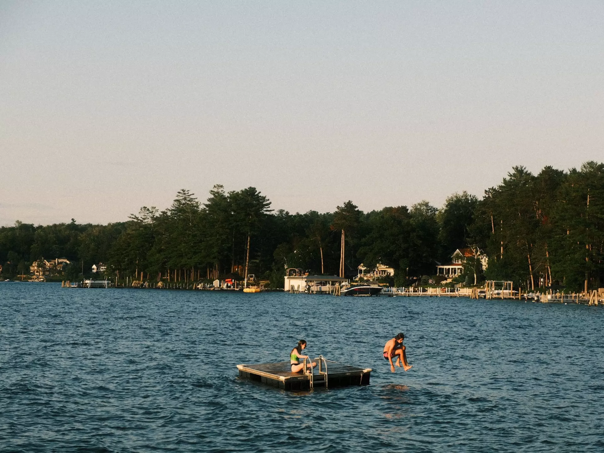 Lake Winnipesaukee, New Hampshire, United States - July 13th, 2024: People jumping into the lake during summer time, License Type: media, Download Time: 2025-01-17T20:47:34.000Z, User: adouglaslott59, Editorial: true, purchase_order: 65050 - Digital Destinations and Articles, job: Future digital articles, client: Future digital articles, other: Ann Douglas Lott