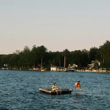 Lake Winnipesaukee, New Hampshire, United States - July 13th, 2024: People jumping into the lake during summer time, License Type: media, Download Time: 2025-01-17T20:47:34.000Z, User: adouglaslott59, Editorial: true, purchase_order: 65050 - Digital Destinations and Articles, job: Future digital articles, client: Future digital articles, other: Ann Douglas Lott