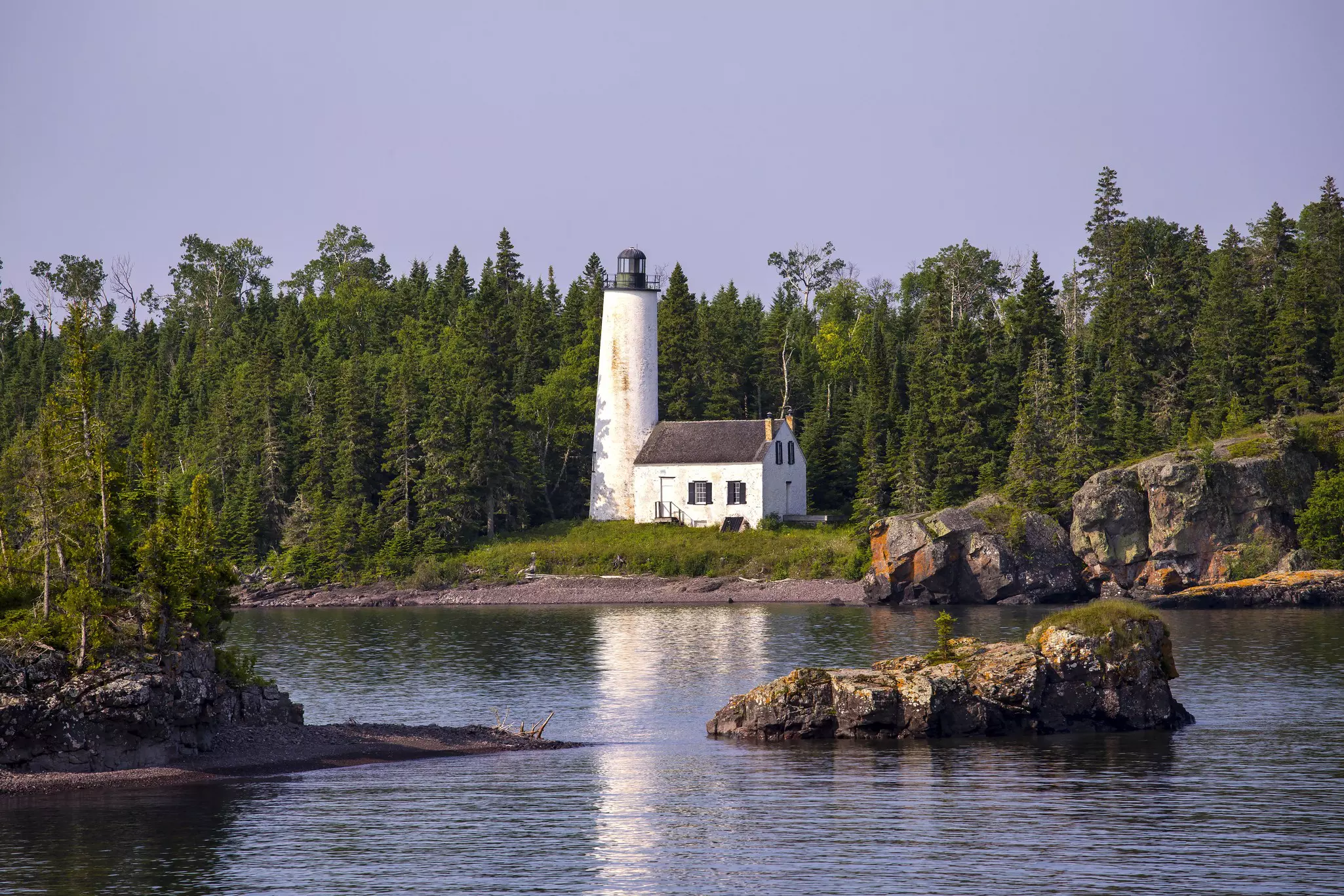 Rock Harbor Lighthouse on Isle Royale National Park, a 210-sq-mile island floating in Lake Superior that’s accessible only by ferry or seaplane © StevenSchremp / Getty Images