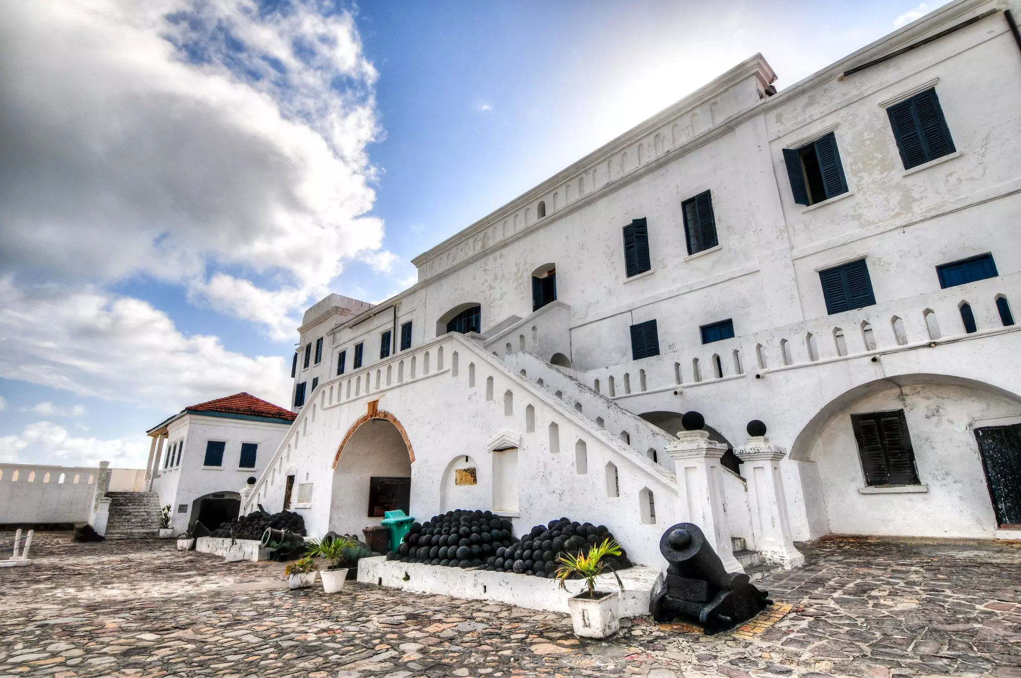 Cape Coast Castle's whitewashed walls bely the dark history inside © Felix Lipov / Shutterstock
