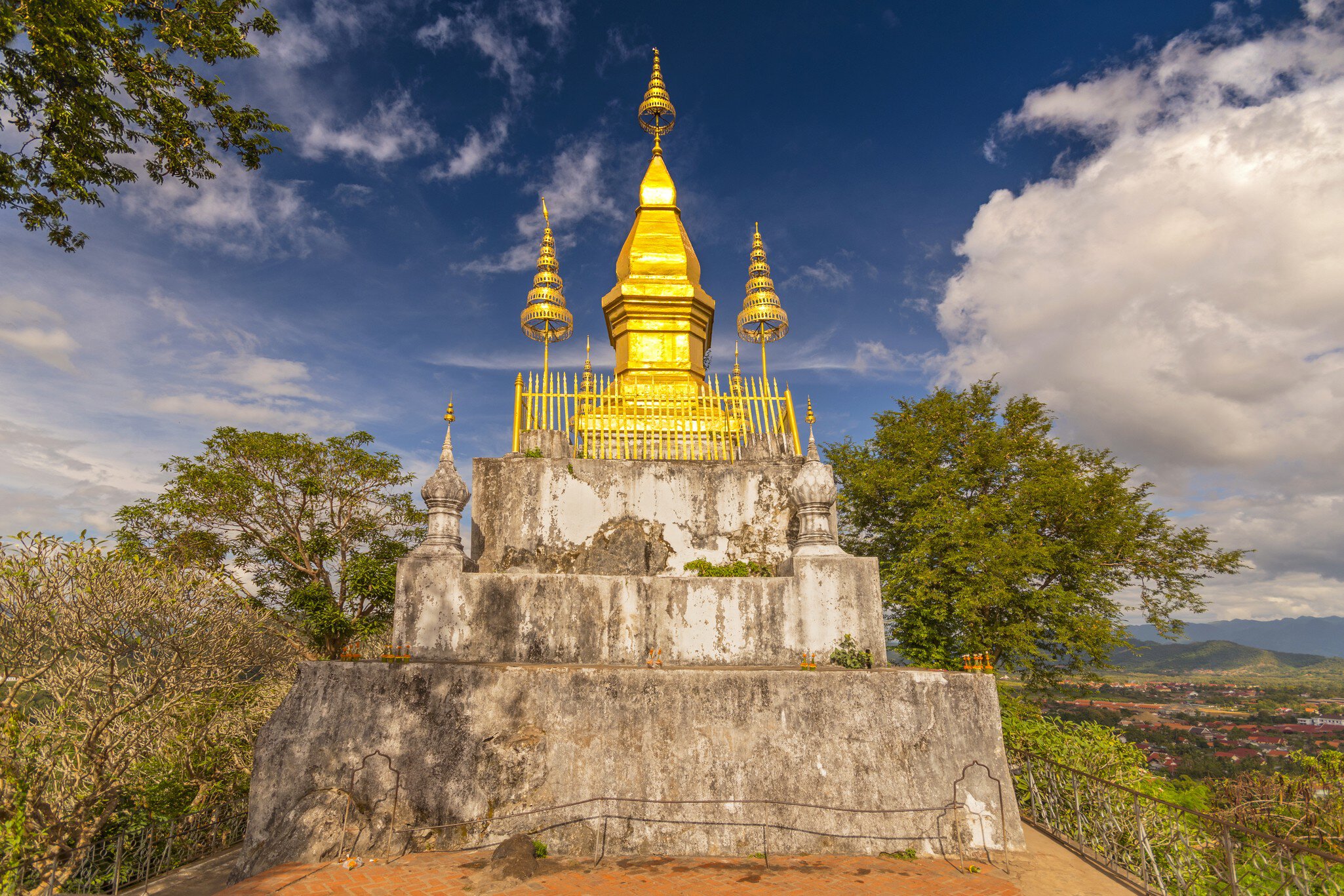 Golden Wat That Chomsi temple Stupa on Mount Phousi in Luang Prabang, Laos., License Type: media, Download Time: 2025-05-29T14:38:31.000Z, User: lonelyplanetmedia, Editorial: false, purchase_order: 65050 - Digital Destinations and Articles, job: Global Publishing WIP, client: Global Publishing WIP, other: Peterson Haggarty // SS Comp Ingestion