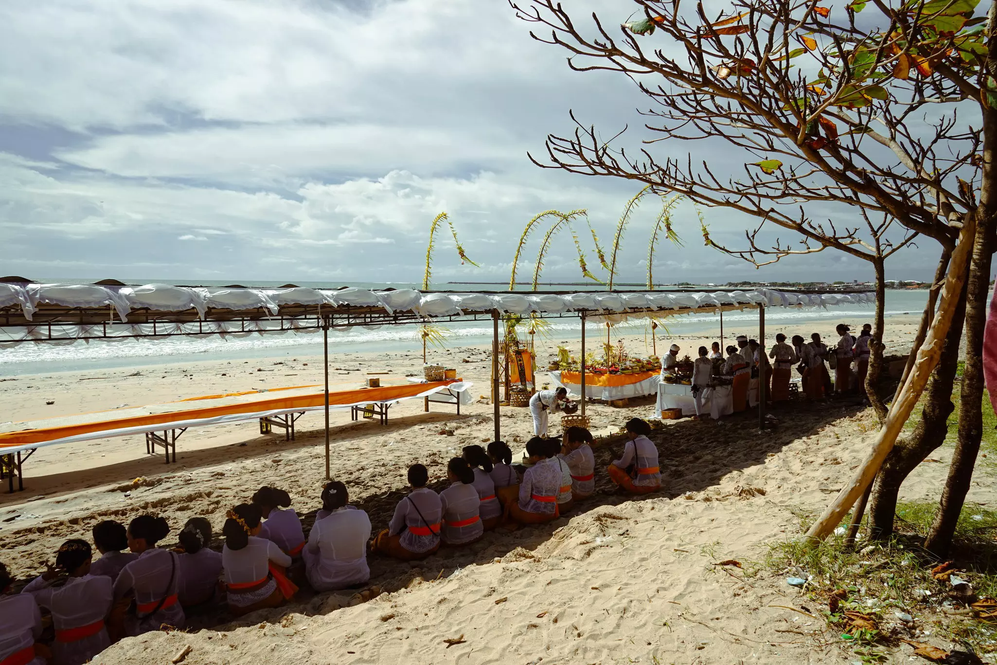A Melasti procession on the beach in Jimbaran, Bali, during Nyepi. 