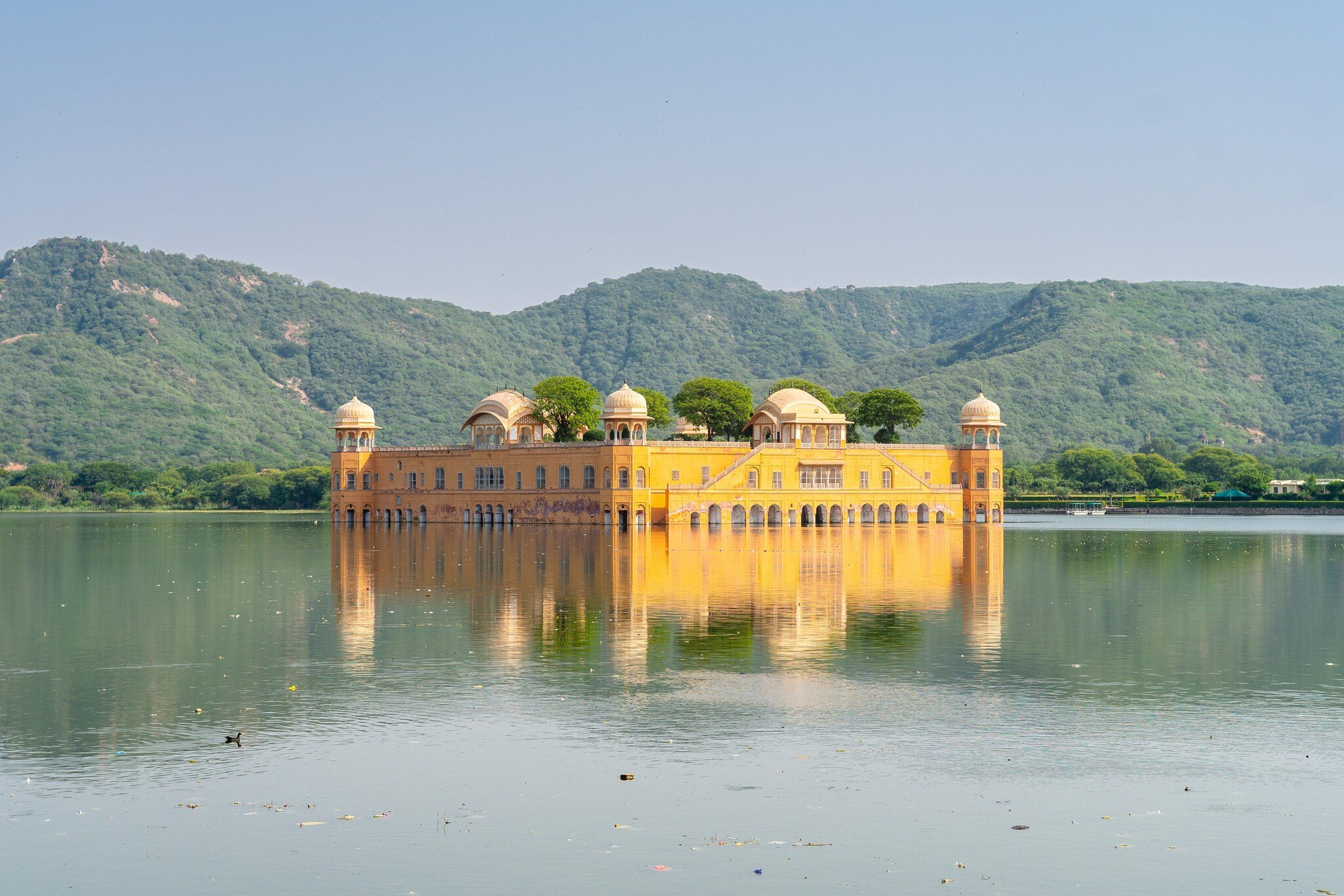 Wide exterior view of Jal Mahal palace in Jaipur, India.