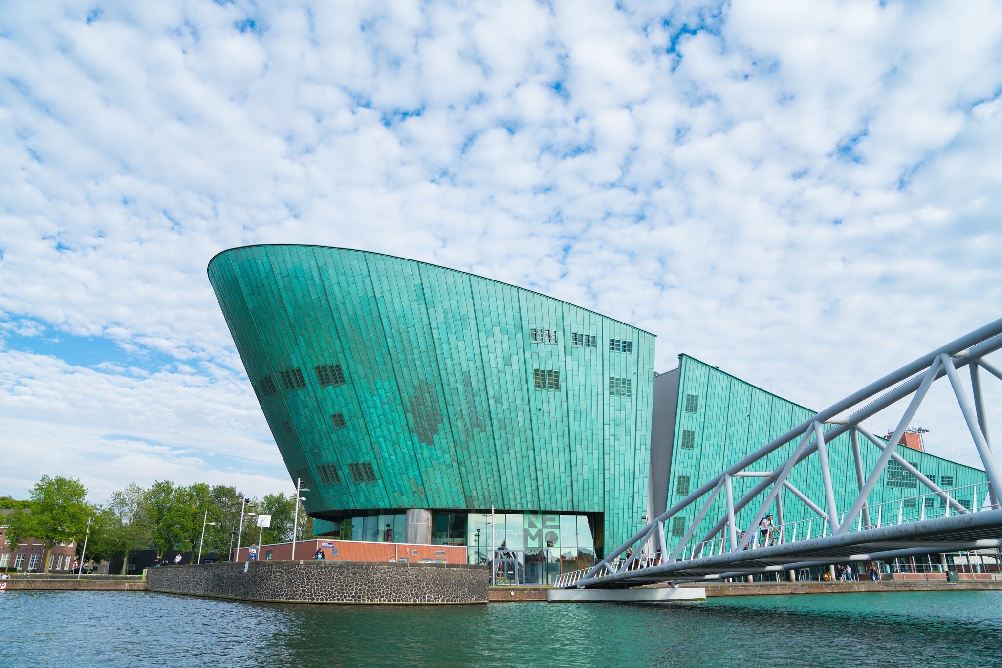 View of the Nemo Museum from across the water in Amsterdam, Netherlands. 