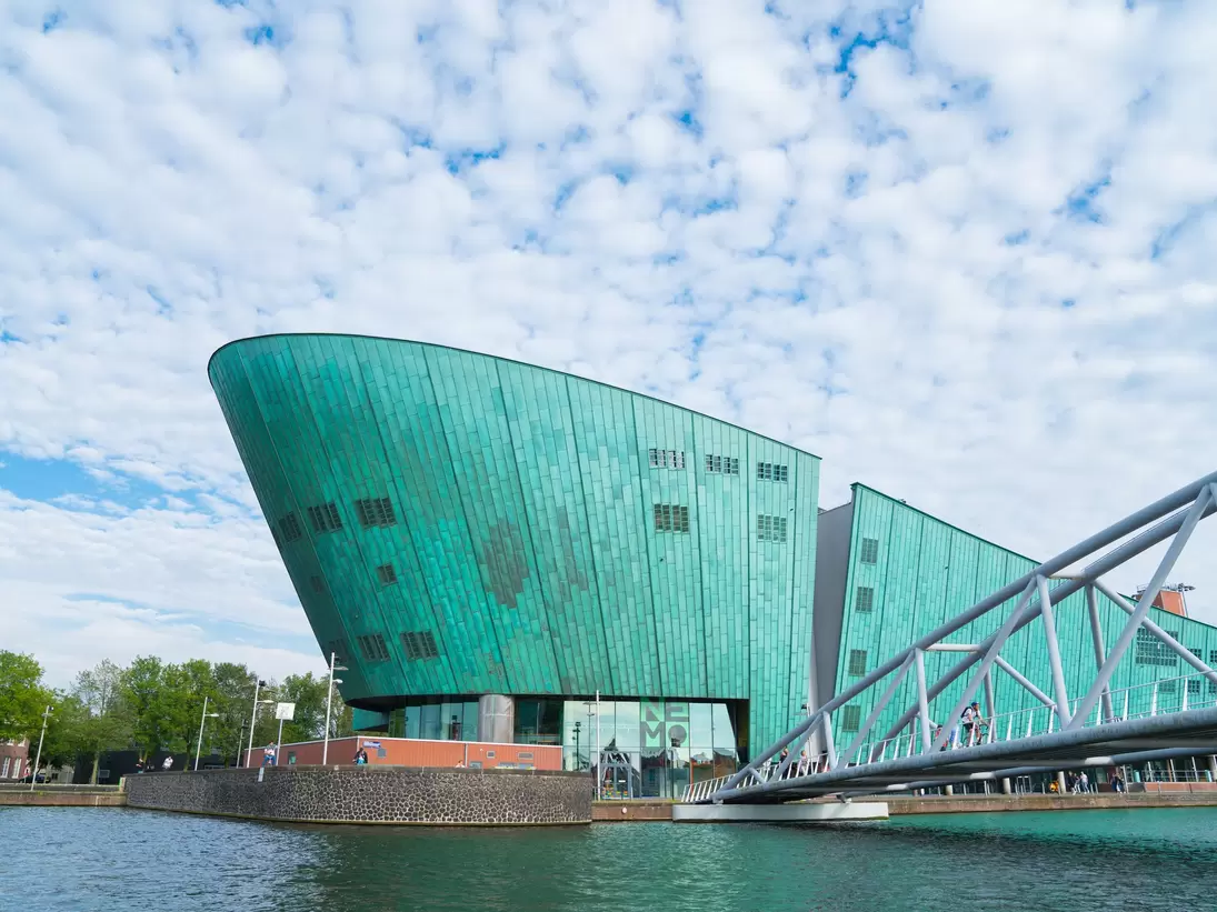 View of the Nemo Museum from across the water in Amsterdam, Netherlands. 